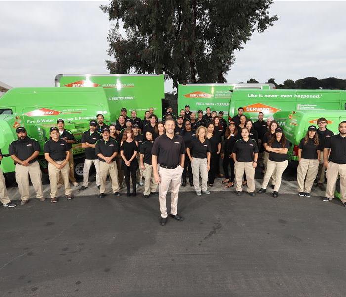 office staff and technicians gathered together for company photo